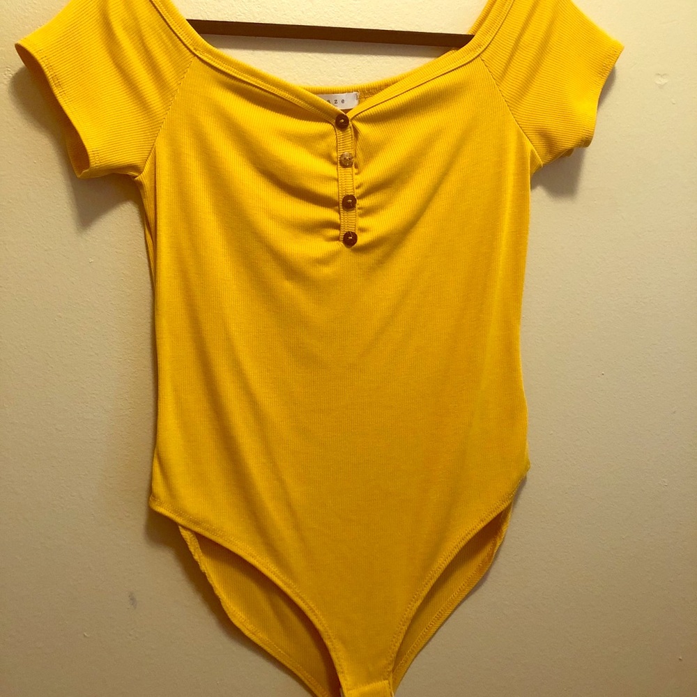 Mustard yellow ribbed bodysuit.